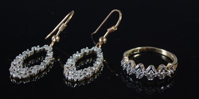 Lot 83 - A yellow metal and diamond set dress ring,...