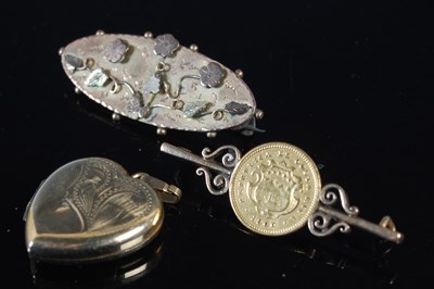 Lot 90 - A 9ct gold heart shaped locket; a 9ct gold...