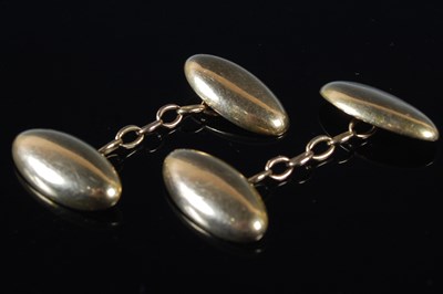 Lot 93 - A pair of yellow metal oval cufflinks (tests...