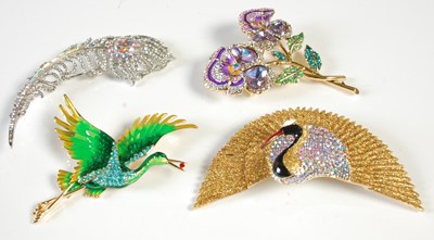 Lot 98 - Four costume jewellery brooches, one in the...