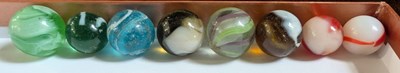 Lot 110 - A box of assorted vintage glass marbles, to...