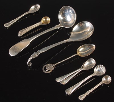 Lot 119 - A collection of silver flatware to include an...