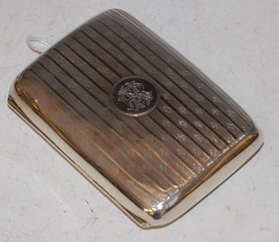 Lot 117 - A Birmingham silver cigarette case with engine...