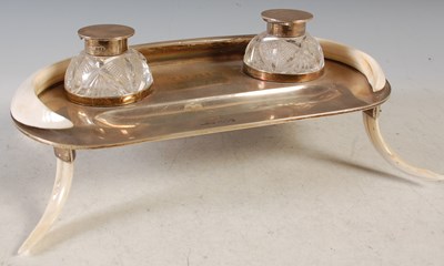 Lot 133 - A London silver and boars tusk desk stand, set...
