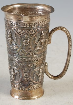 Lot 136 - An Indian/ Burmese silver double sided...