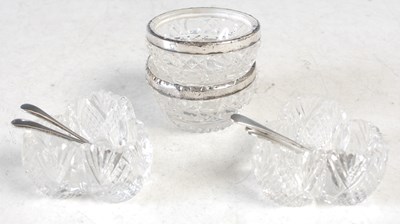 Lot 152 - Two white metal mounted clear glass salts;...