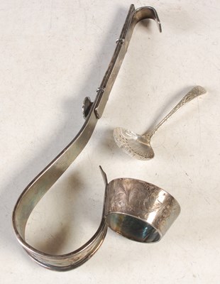 Lot 154 - A white metal wine bottle/ champagne bottle...