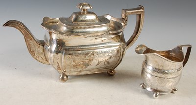 Lot 171 - A George III Irish silver tea pot, Dublin 1813,...