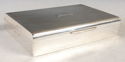 Lot 201 - A Birmingham silver cigarette box with engine...
