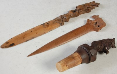 Lot 206 - A group of Black Forest carved wooden ware to...