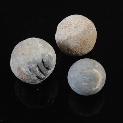 Lot 208 - A group of three Antique lead Musket balls,...