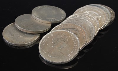 Lot 218 - A box containing a collection of assorted crowns.