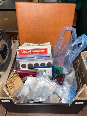 Lot 288 - A box of assorted vintage proof sets, crowns,...