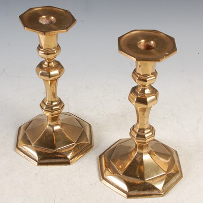 Lot 310 - A pair of brass octagonal shaped candlesticks...