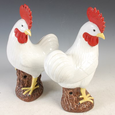 Lot 320 - A pair of French porcelain models of Cockerels,...