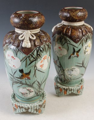 Lot 322 - A pair of Japanese porcelain tied sack form...