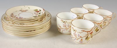 Lot 323 - A Moore Brothers ivory ground part tea set,...