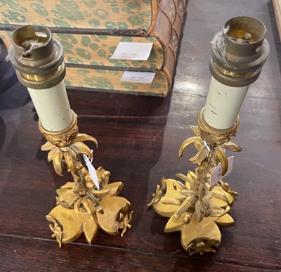 Lot 396 - A pair of gilt metal flower form table lamps,...
