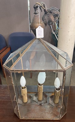 Lot 403 - An octagonal shaped metal and glass three...