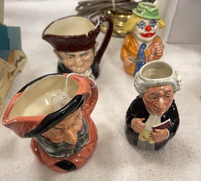 Lot 408B - A group of Doulton character jugs to include...