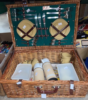 Lot 413 - A vintage wicker picnic hamper, cutlery,...