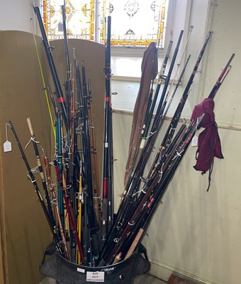 Lot 423 - A large collection of assorted fishing rods.