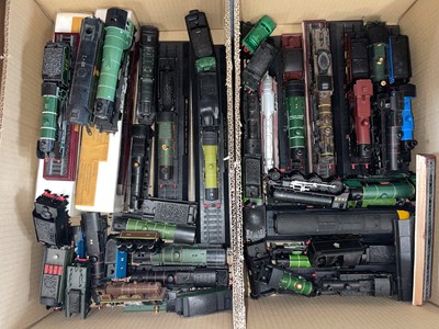 Lot 424 - Two boxes of assorted model trains.