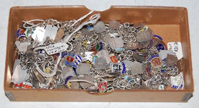 Lot 138 - Twelve assorted white and enamel charm...