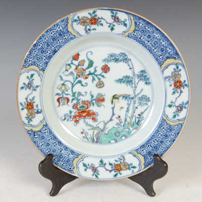 Lot 270 - A group of three Chinese porcelain plates,...
