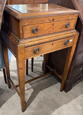 Lot 576 - An early 20th century oak table canteen case,...