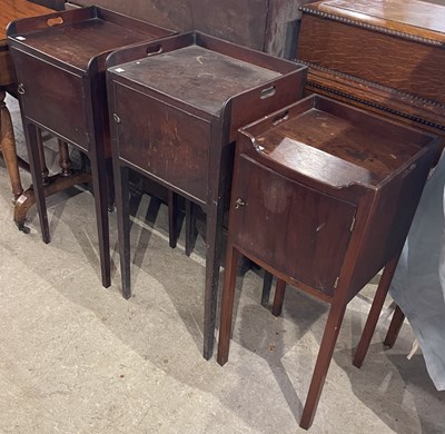 Lot 587 - Three assorted mahogany pot cupboards, each...