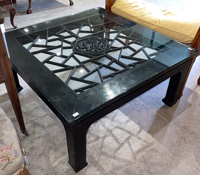 Lot 597 - A Chinese darkwood square shaped coffee table,...