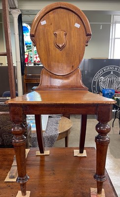Lot 601 - A 19th century mahogany hall chair, the oval...