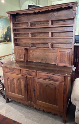 Lot 610 - An Antique French Provincial blondewood...
