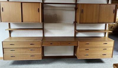 Lot 615 - A vintage Ladderax shelving system comprising...
