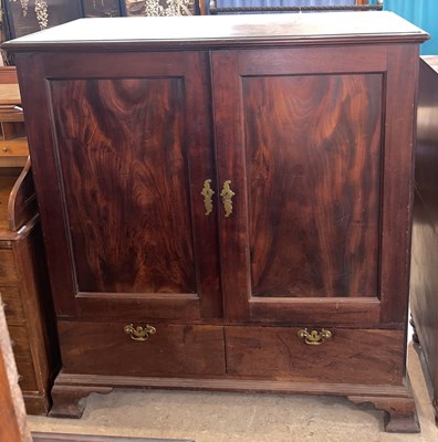 Lot 618 - A George III mahogany cupboard/ butlers...