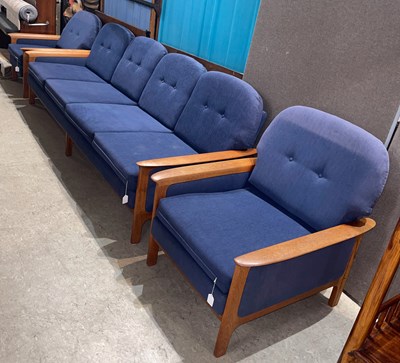 Lot 626 - A mid-century teak three piece lounge suite...