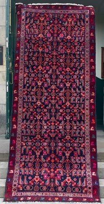 Lot 632 - A Persian Hamadan long rug, the rectangular...