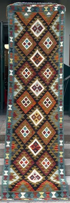 Lot 635 - A Maimana Kilim runner, the ochre ground...