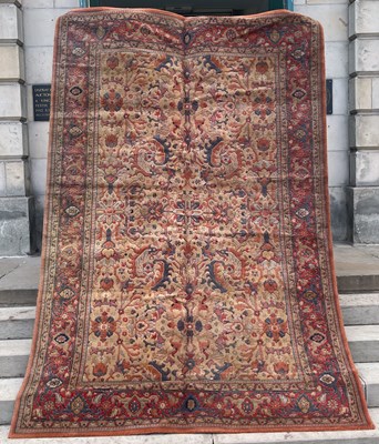 Lot 645 - A machine-made Persian carpet, 300cm x 203cm.