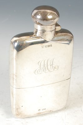 Lot 231F - A Chester solid silver hip flask, engraved...