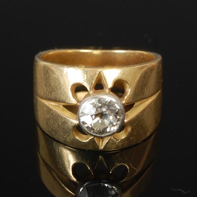 Lot 257G - An 18ct gold ring, set with a single diamond,...