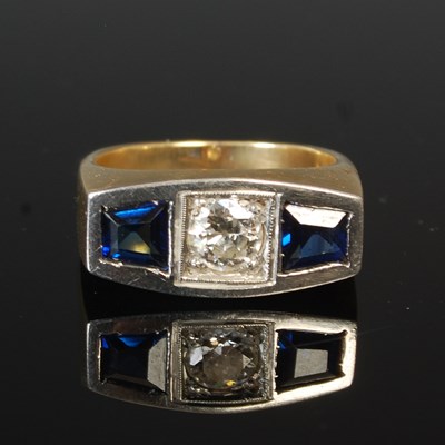 Lot 53F - A large 18k gold three stone ring, set with a...
