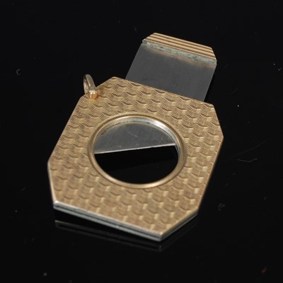 Lot 248E - A 9ct gold Art Deco engine turned cigar cutter,...