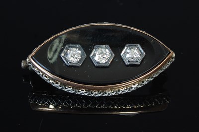 Lot 248F - A Victorian mourning brooch, set with three...