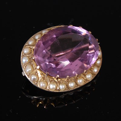 Lot 235E - A yellow metal, amethyst and pearl set oval...