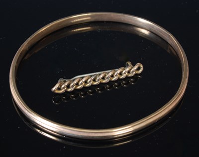 Lot 235G - A yellow metal bangle, stamped '9ct', 85.7mm...