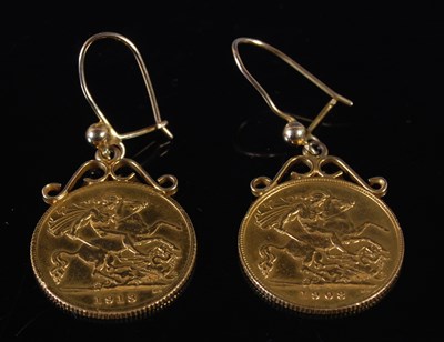 Lot 246 - A pair of gold half sovereigns, later mounted...