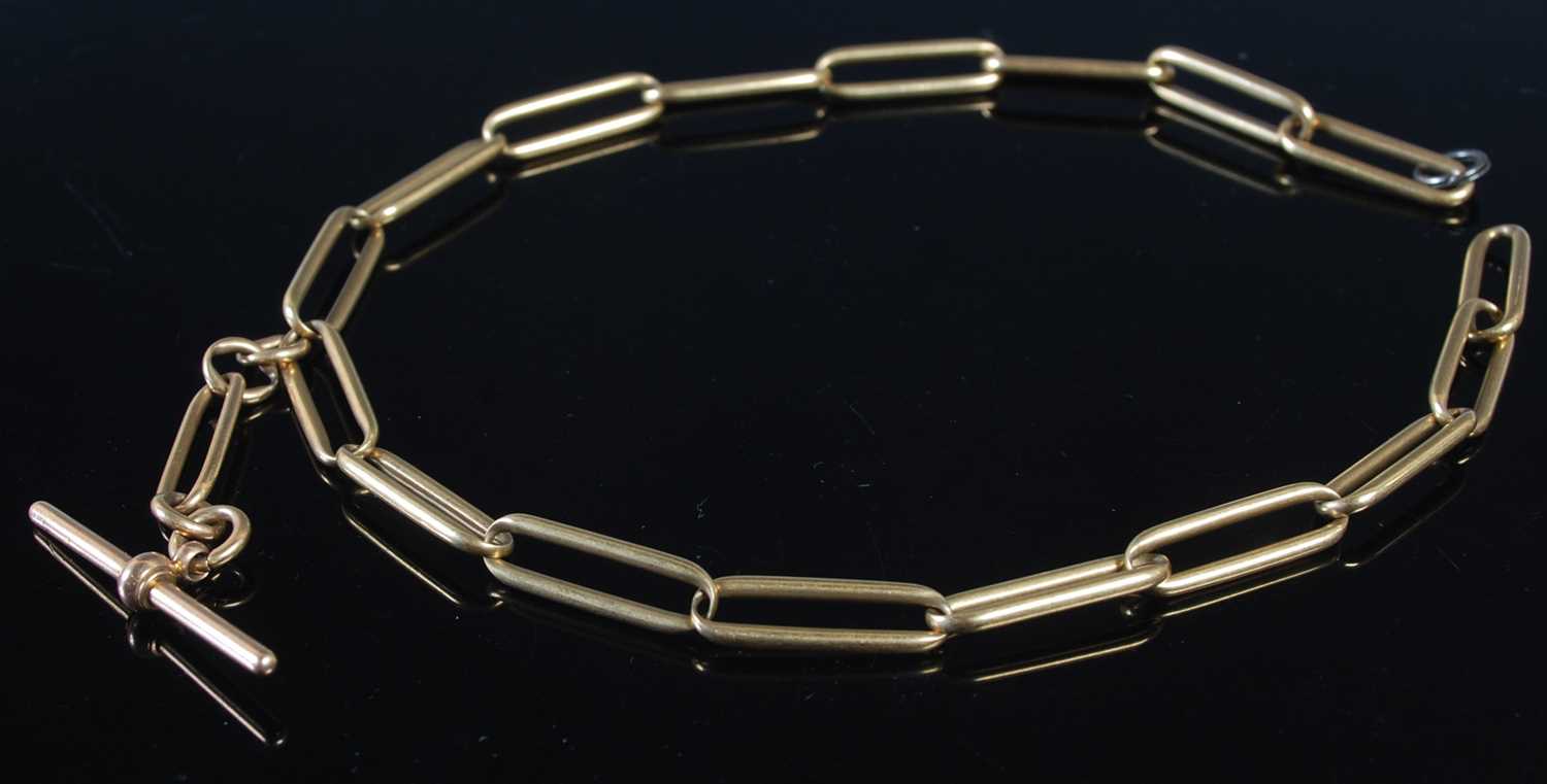 Lot 251 - A yellow metal oval link chain, tests as 18ct...