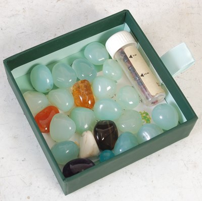 Lot 258E - A box of assorted uncut polished jadeite and...
